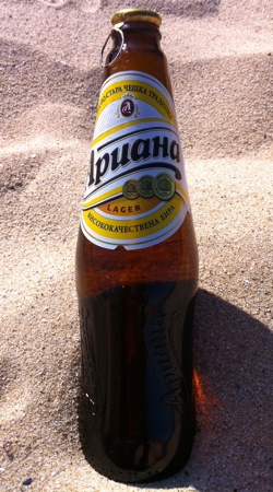 Фирменная бутылка пива Ариана Lager