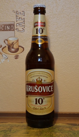 Фирменная бутылка пива Krusovice 
