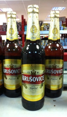 Фирменная бутылка пива Krusovice Imperial