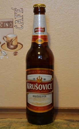 Фирменная бутылка пива Krusovice 