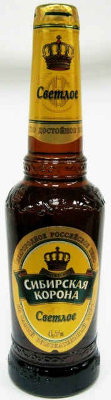 Знаменитая рельефная бутылка пива Сибирская корона Светлое - фото