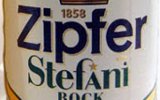 Фирменная бутылка и бокал австрийского пива Zipfer Stefanibock