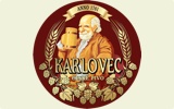 Фирменная бутылка пива Karlovec Tmavy Lezak